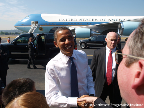 President Obama waves upon arrival in Seattle
