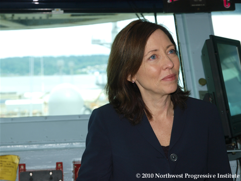 Senator Cantwell listens as Captain Kuzmick and Rear Admiral Aucoin review the Stennis' operational history