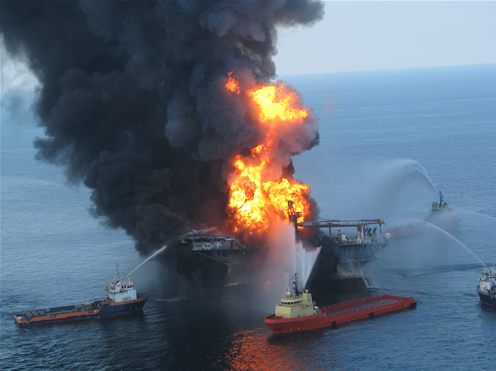 Tugs attempt to put out rig fire