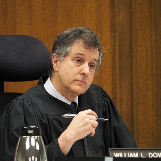 Judge William Downing listens to oral arguments in Lee v. State, the legal challenge to Tim Eyman's I-1366