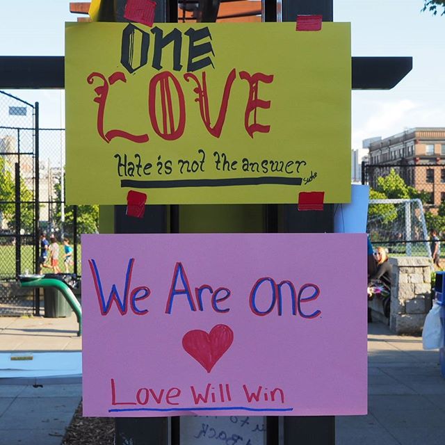 Scenes from Seattle's Vigil for Orlando: Signs posted welcoming people to Cal Anderson Park
