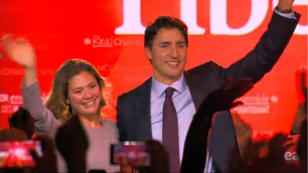 Victorious Trudeau waves
