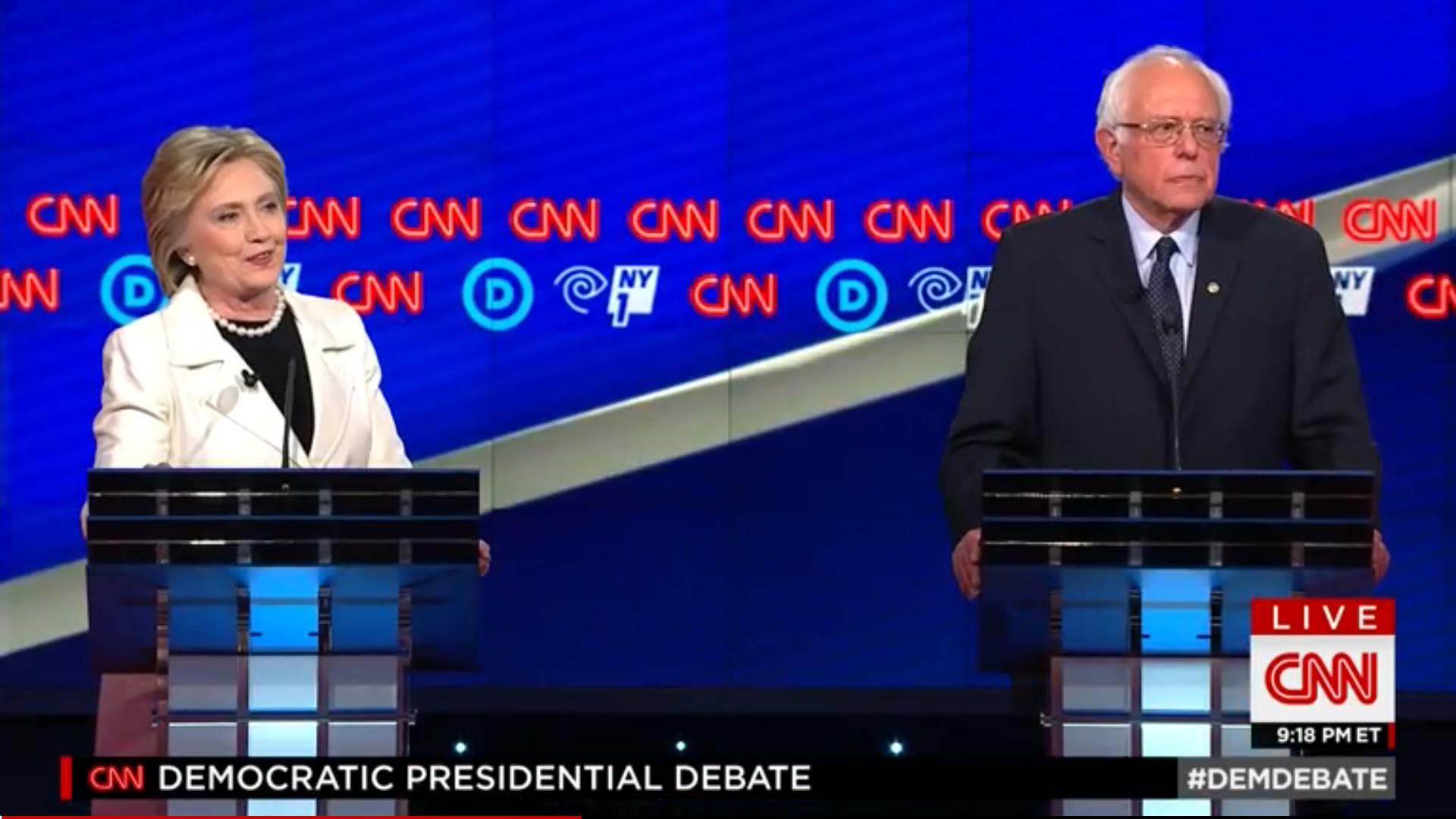 Hillary Clinton and Bernie Sanders speaking at the ninth Democratic debate