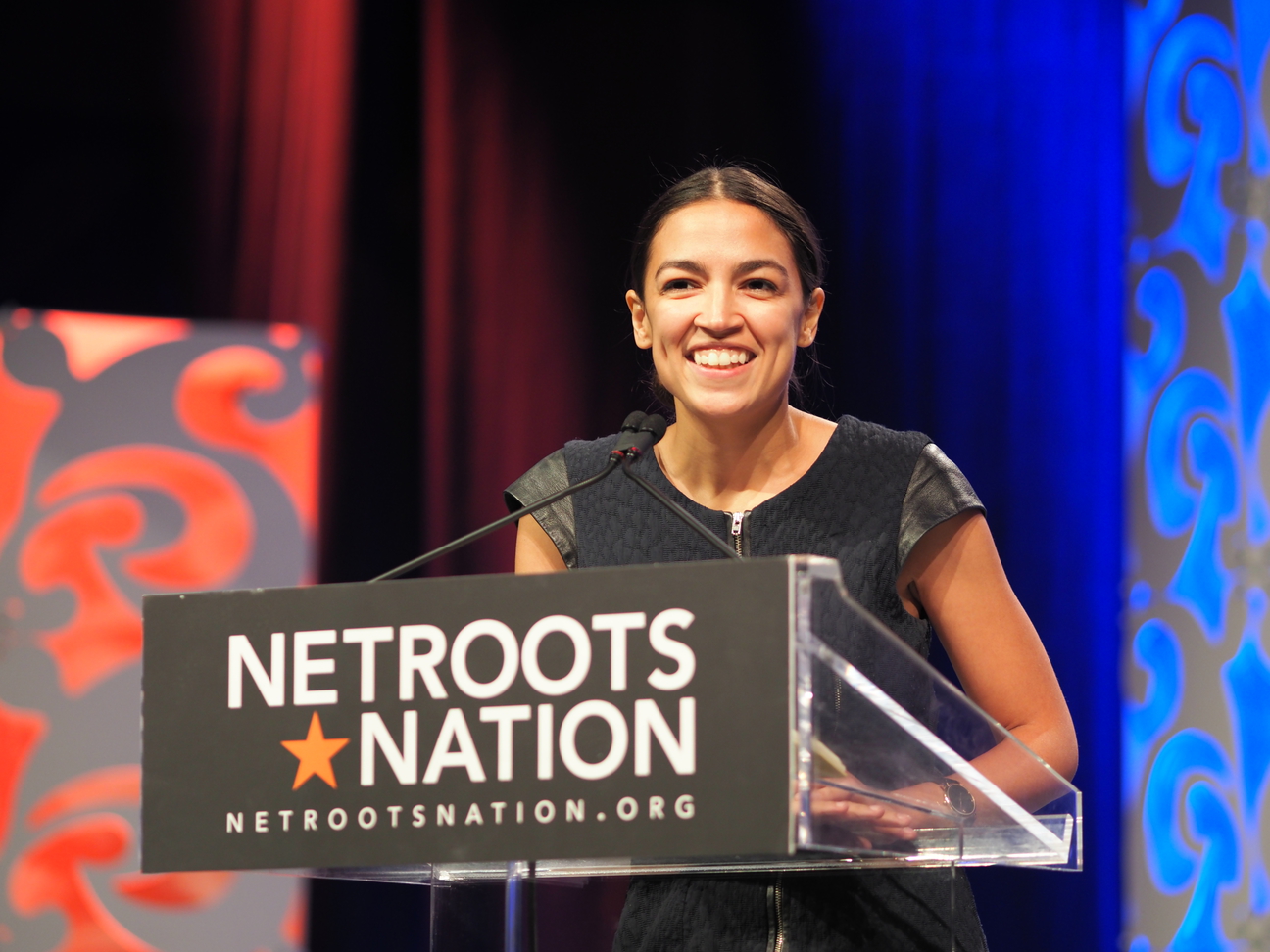 Alexandria Ocasio-Cortez, the Democratic nominee in NY-14, addresses Netroots Nation 2018 during the closing plenary