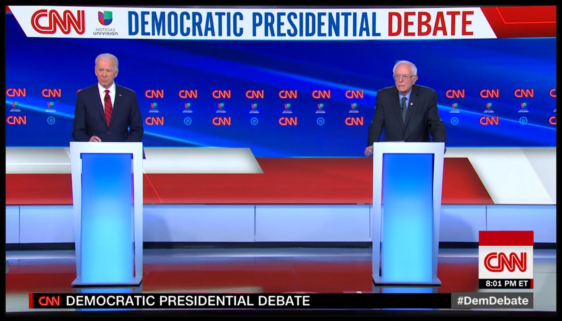 Joe Biden and Bernie Sanders at podiums