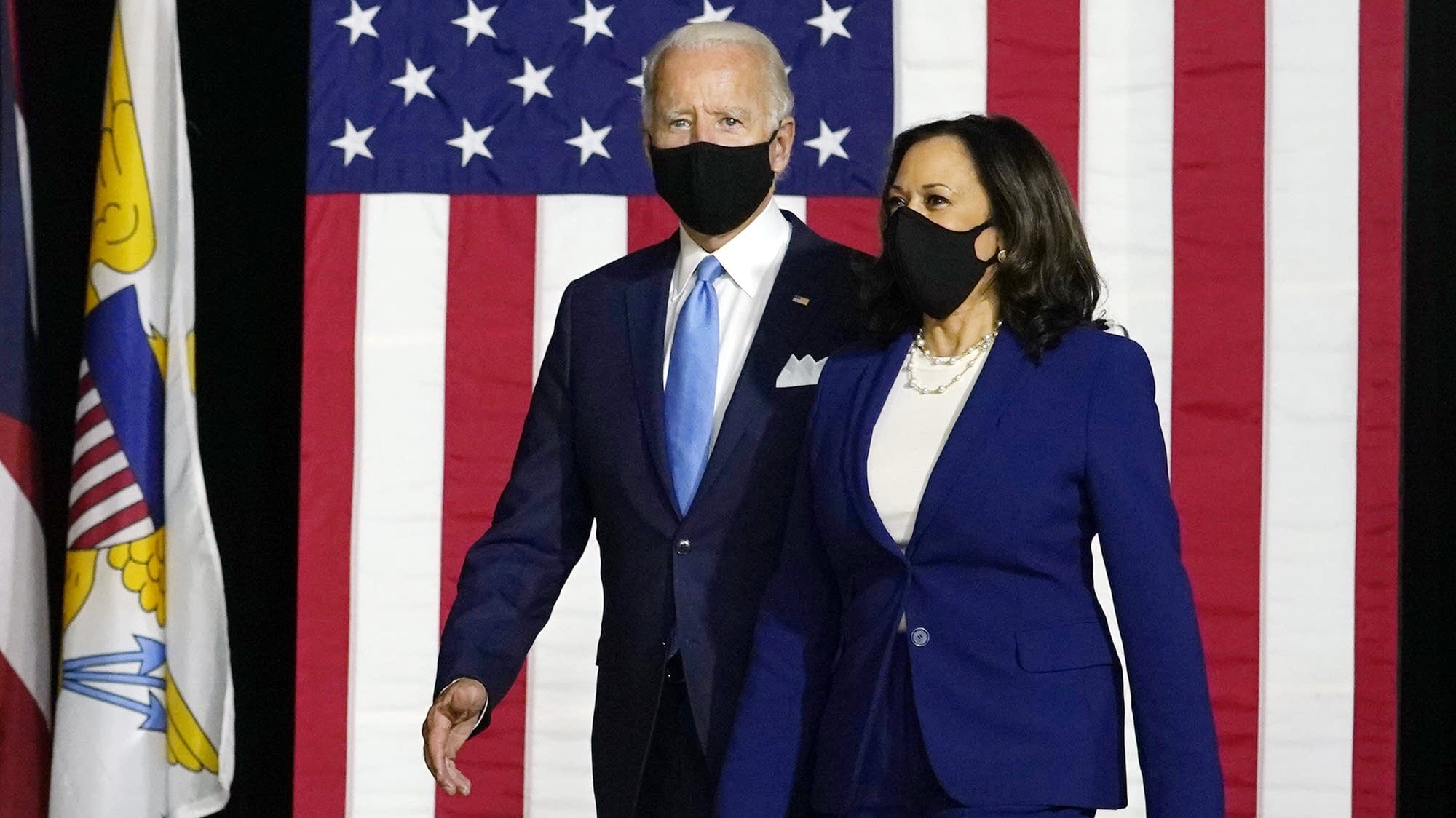 Joe Biden and Kamala Harris walking