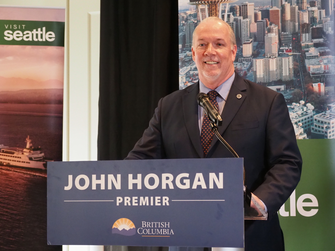 John Horgan speaking at a press conference