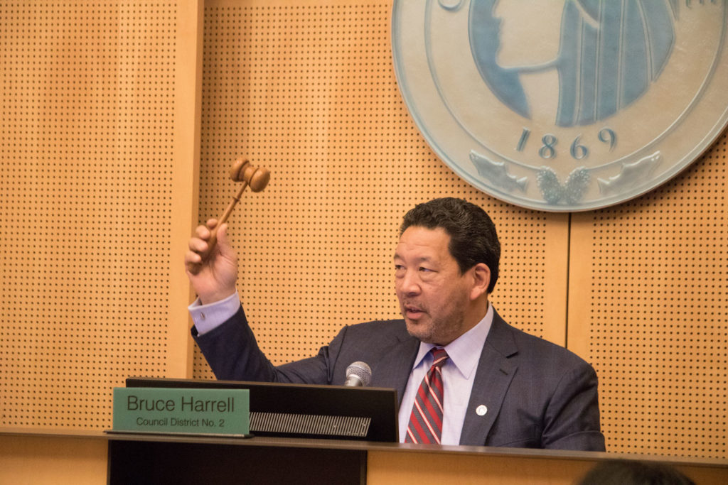 Harrell presides over a City Council meeting in 2019