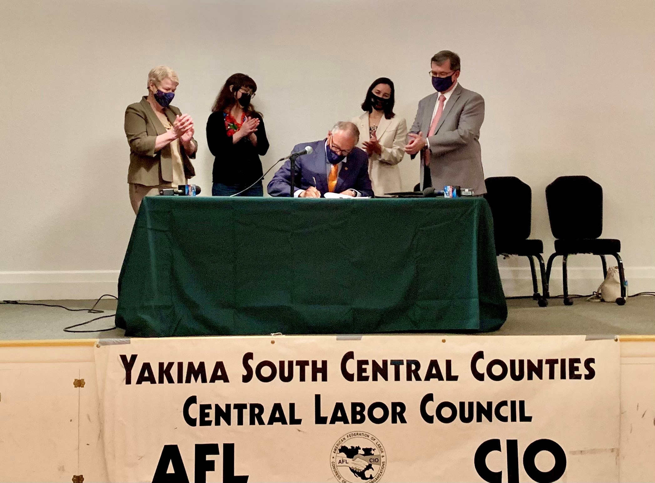 Governor Inslee signs a worker protection bill