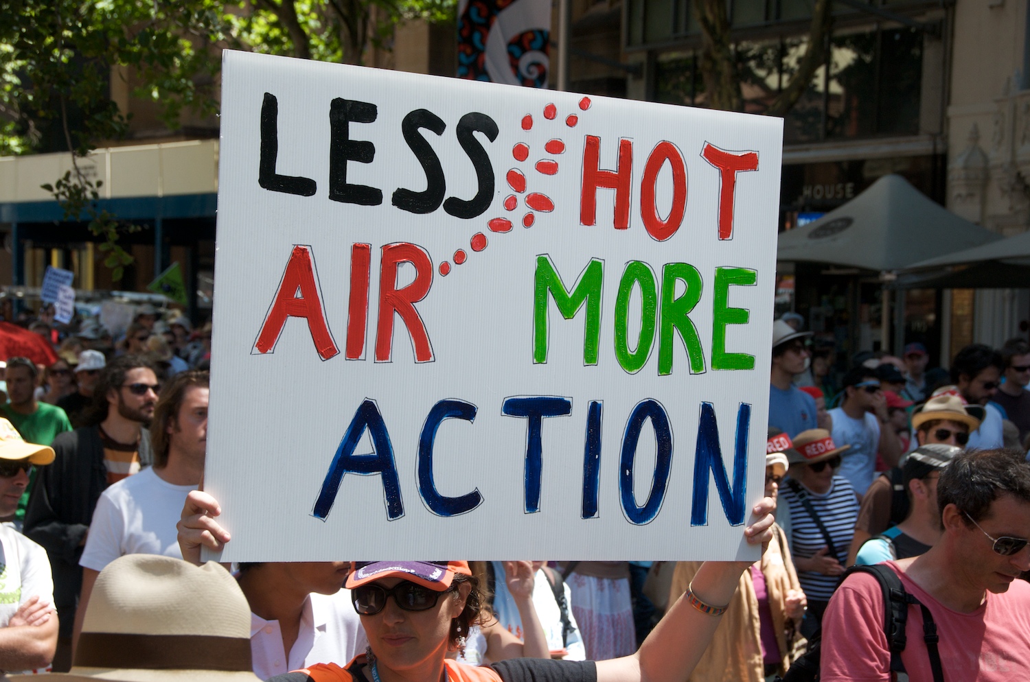 Less hot air, more action: A protest sign in Sydney