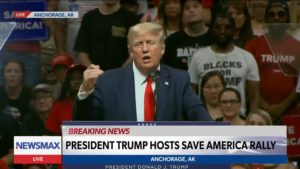 Still of Newsmax broadcast of Trump hatefest in Alaska
