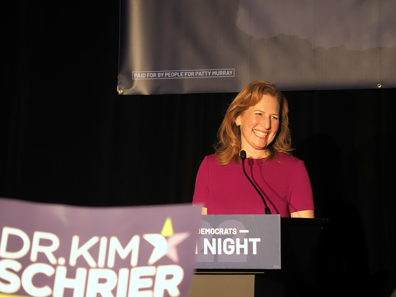 Kim Schrier smiles at supporters during an Election Night victory speech