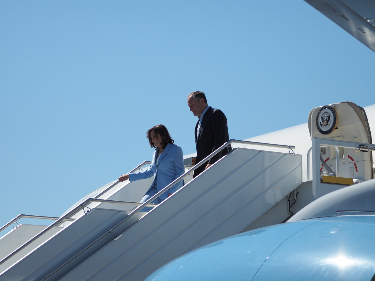 Kamala Harris and Doug Emoff disembark Air Force Two
