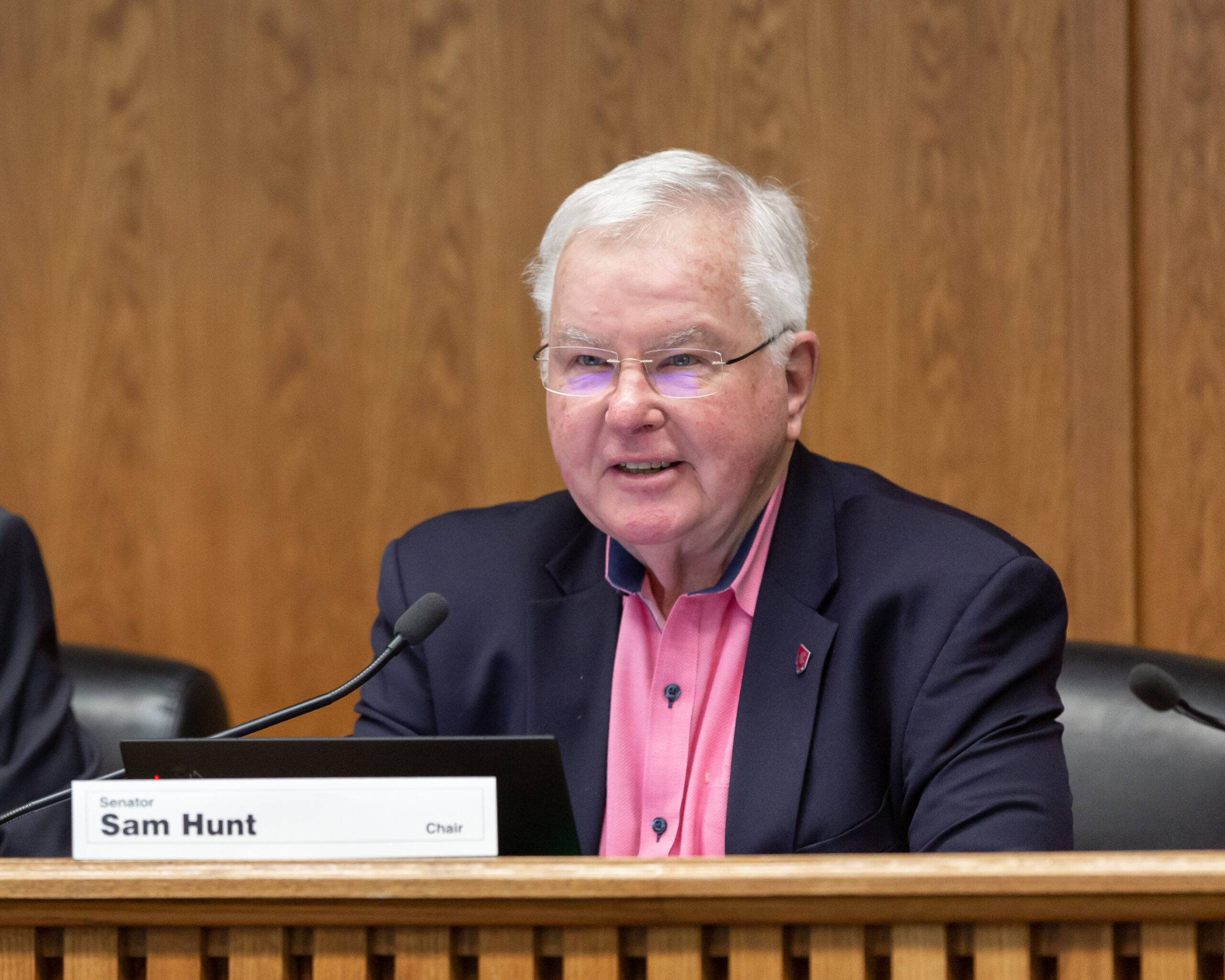 Senator Sam Hunt chairing a committee meeting