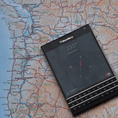 Atlas and BlackBerry Passport with compass